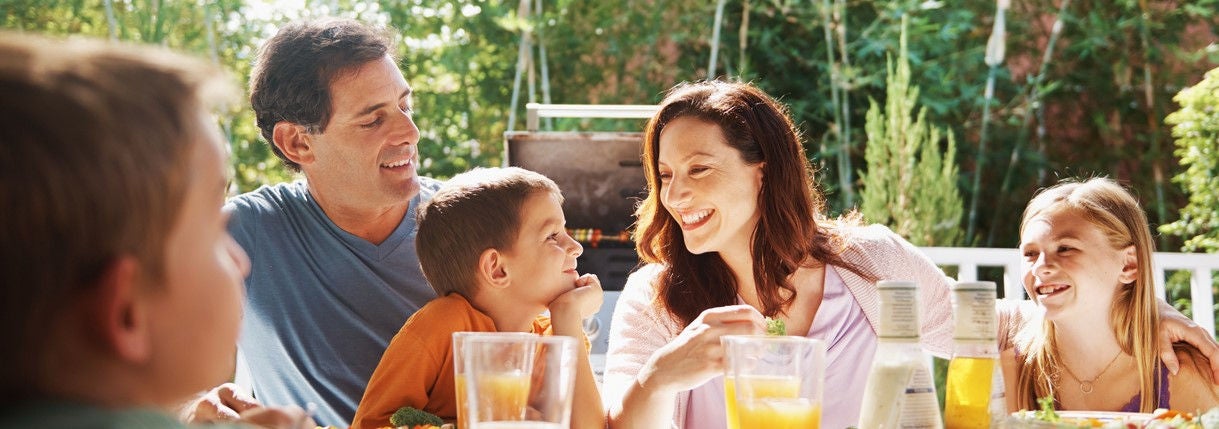 Family outside having lunch