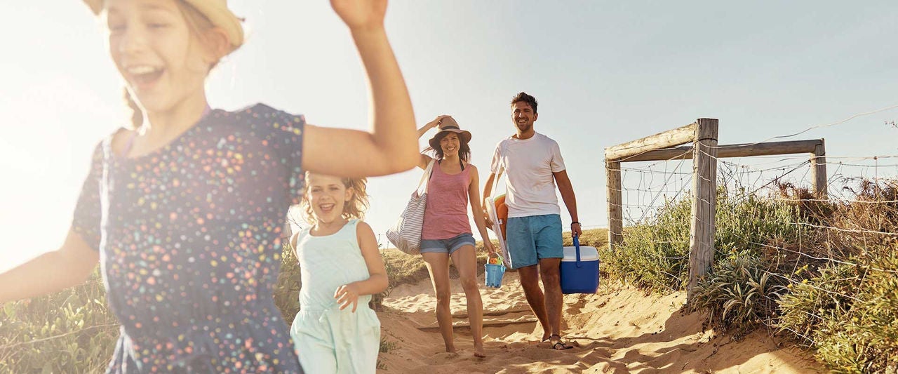 Family on beach track