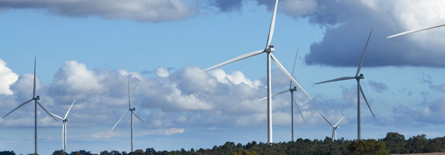 Close up of several wind turbines