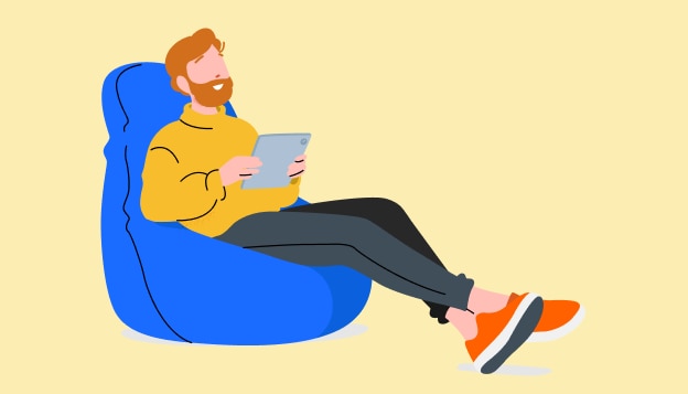 Graphical representation of a smiling bearded man sitting in a beanbag and looking at a tablet
