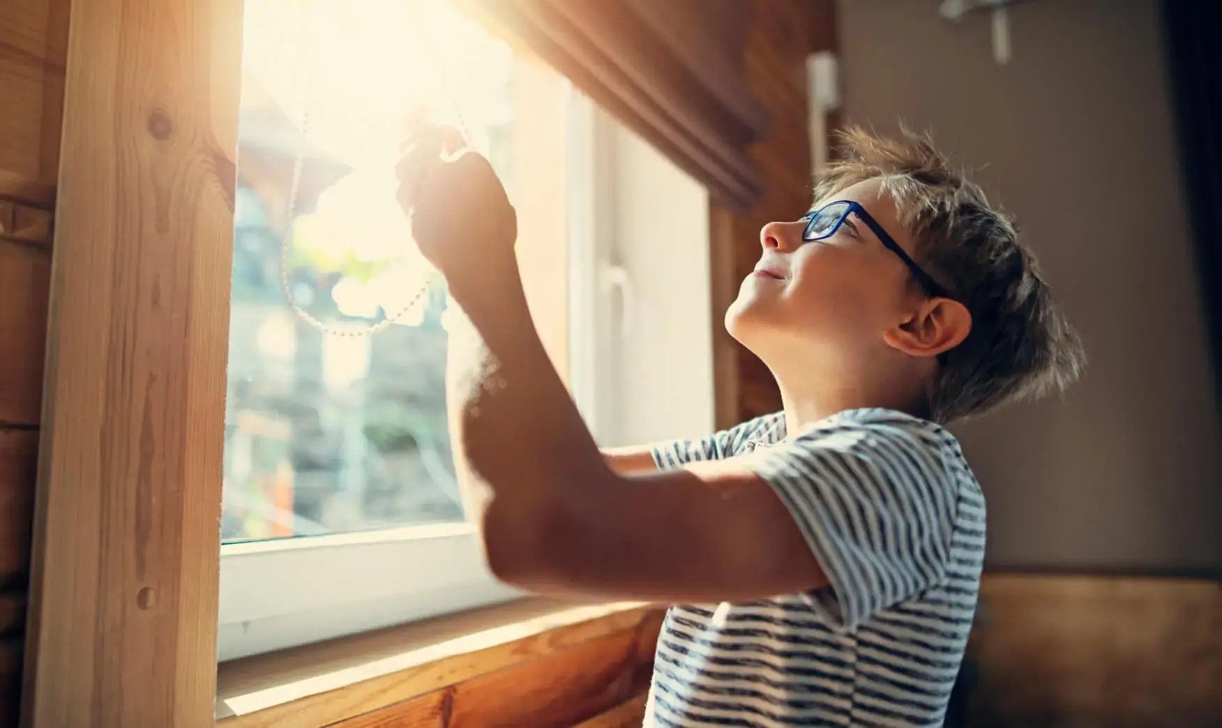 EC Boy opening blinds solar SF Banner